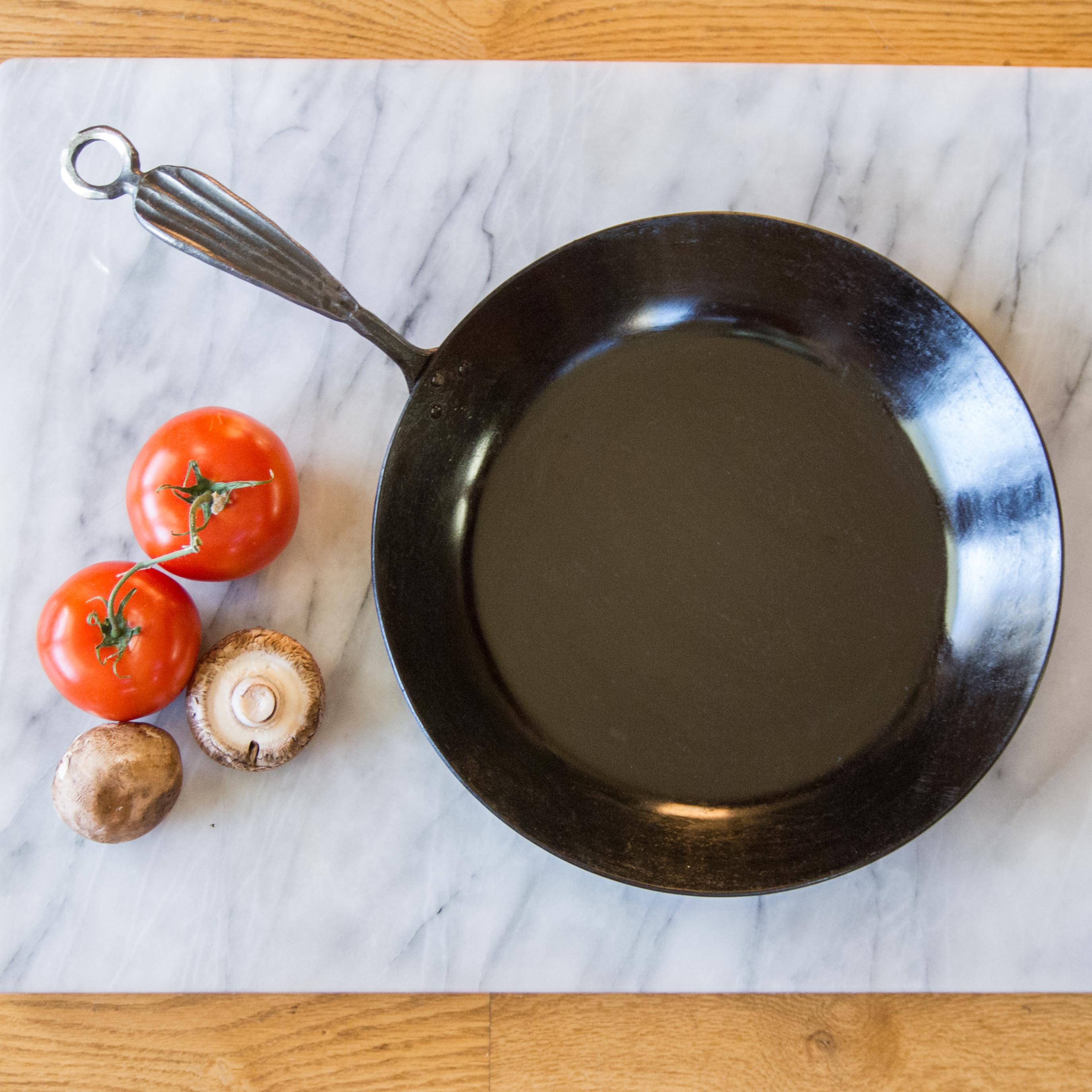 11 Carbon Steel Sauté Pan. Hand forged by Newquist Forge